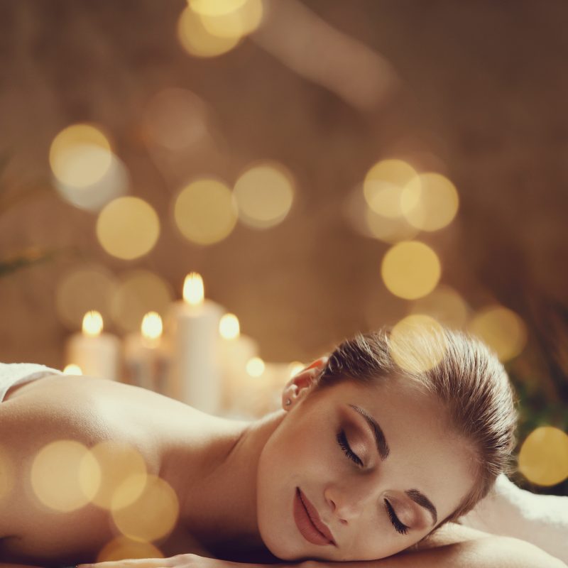 Massage. Beautiful girl in spa salon